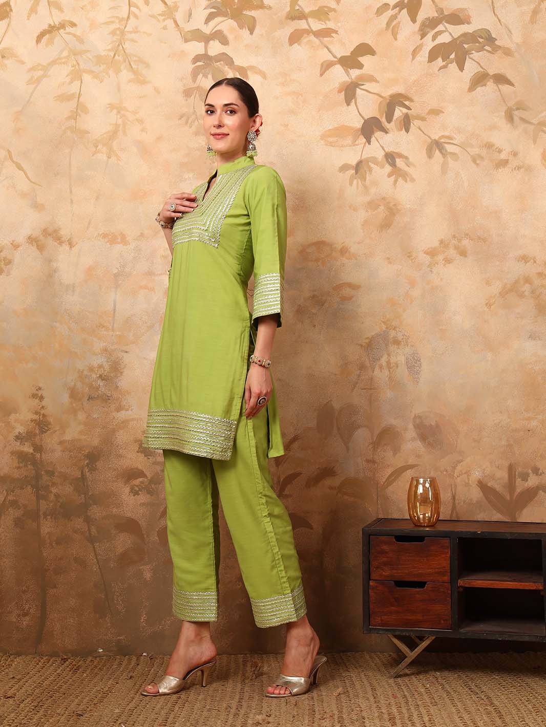 Side view of lime green pure cotton kurta pant set with mandarin collar and gota detailing – Mahukaa women's festive outfit